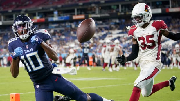 Tennessee Titans wide receiver Dez Fitzpatrick (10) drops a pass in the end zone as he is defended by Arizona Cardinals cornerback Christian Matthew (35) during the fourth quarter of an NFL preseason game at Nissan Stadium Saturday, Aug. 27, 2022, in Nashville, Tenn.